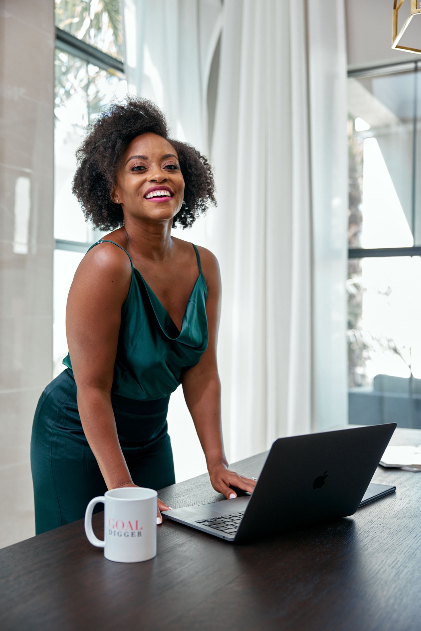 Tiffany Nwahiri working beside her laptop